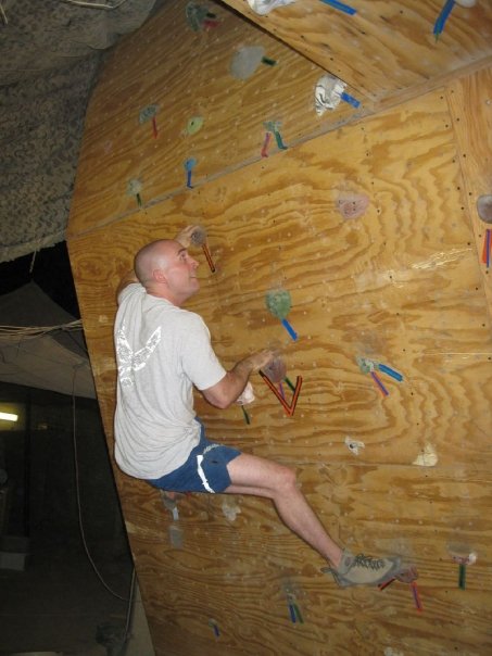 Daniel Johnson on a climbing wall
